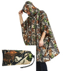 Poncho airsoft imperméable en camouflage feuilles mortes, porté capuche relevée - BDU AIRSOFT